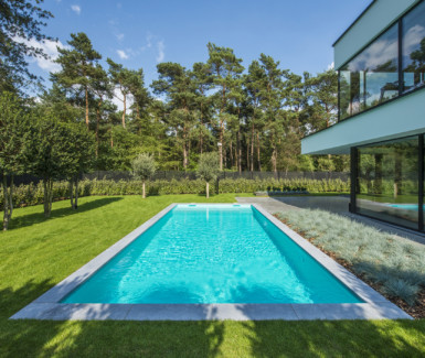 hoge waterlijn skimmer zwembad aangelegd door Eddy Van De Kerkhof